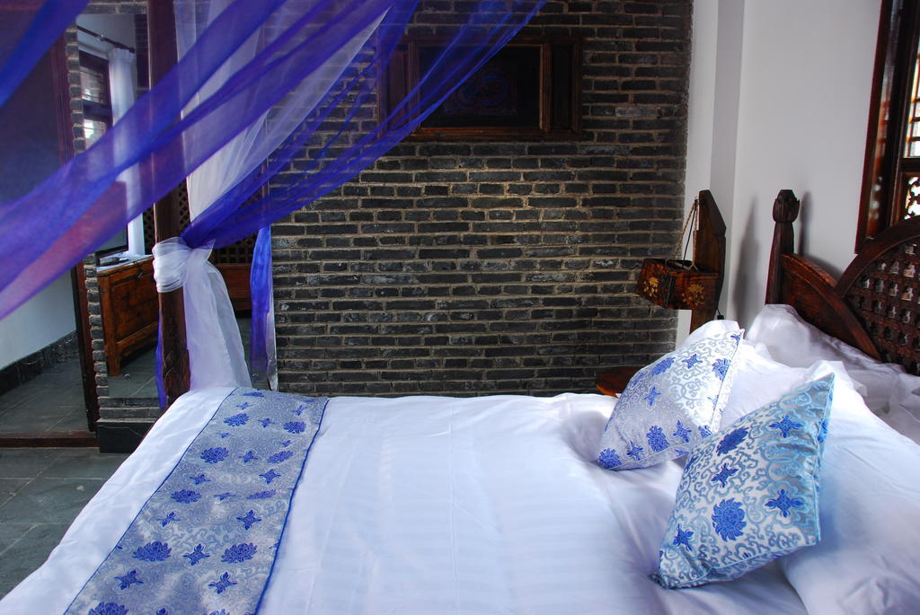 Lazy Tiger Inn Лицзян Номер фото