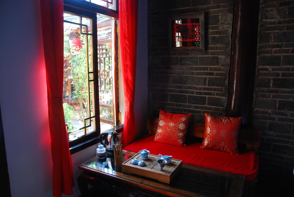 Lazy Tiger Inn Лицзян Номер фото